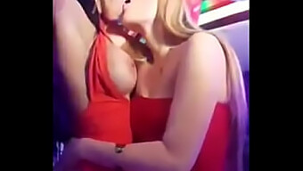 Elisa Sanches kisses a stunning blonde