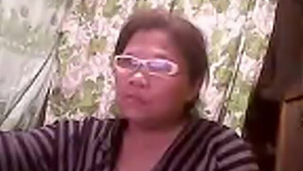 57-Year-Old Asian Webcam Grandma Elizabeth Flaunts Her Allure